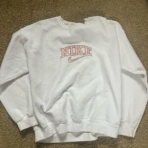 White nike crewneck with orange and blue detailing